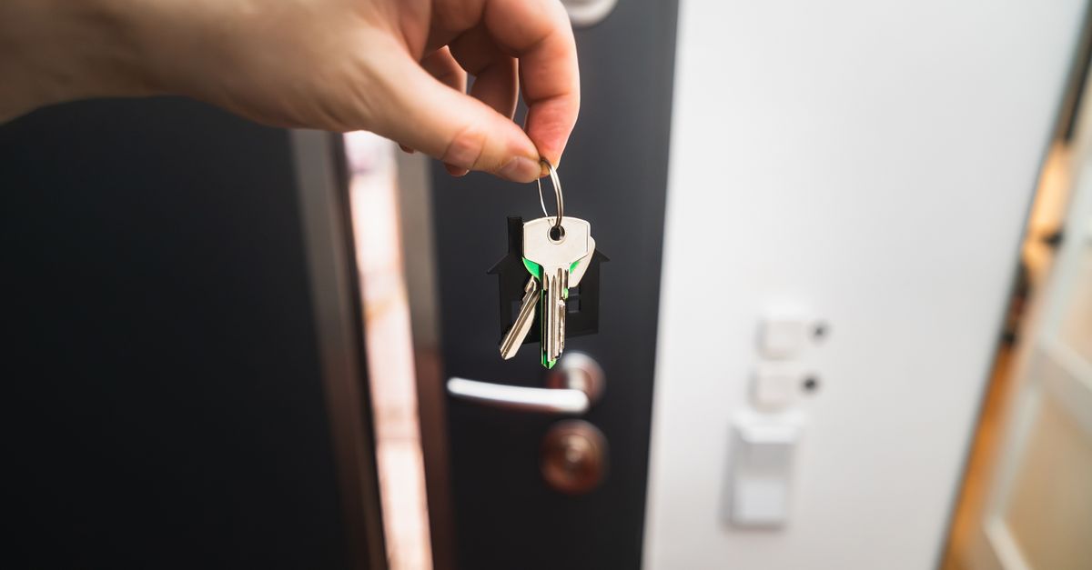 locksmith hands door — Montclair Locksmith Corp