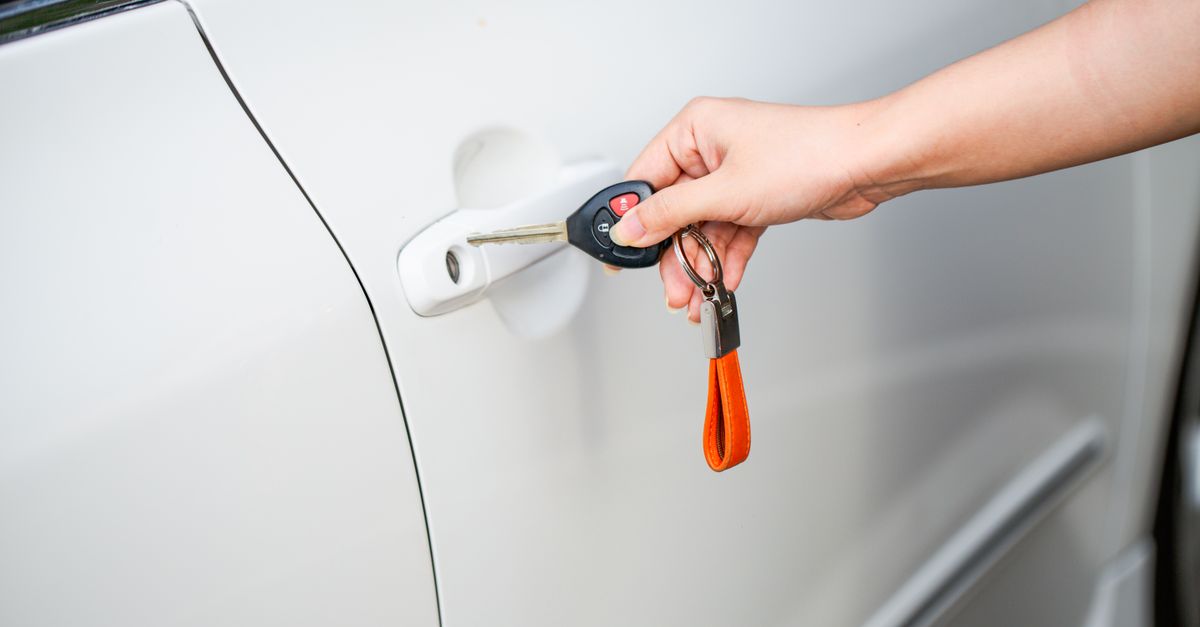 locksmith hands door — Montclair Locksmith Corp