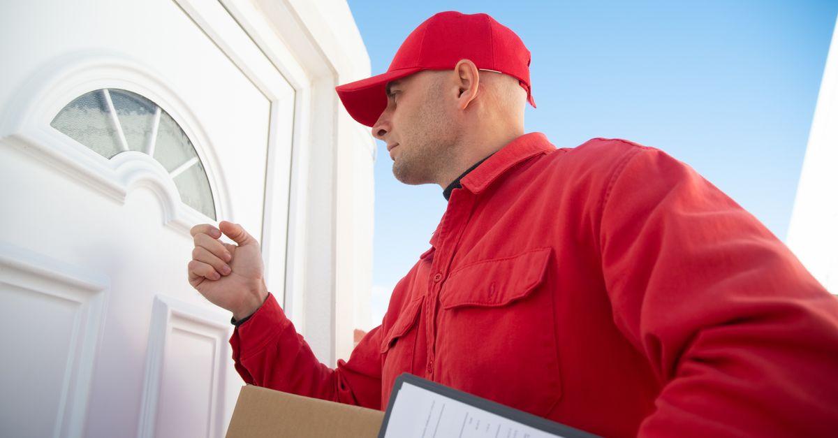 locksmith hands door — Montclair Locksmith Corp