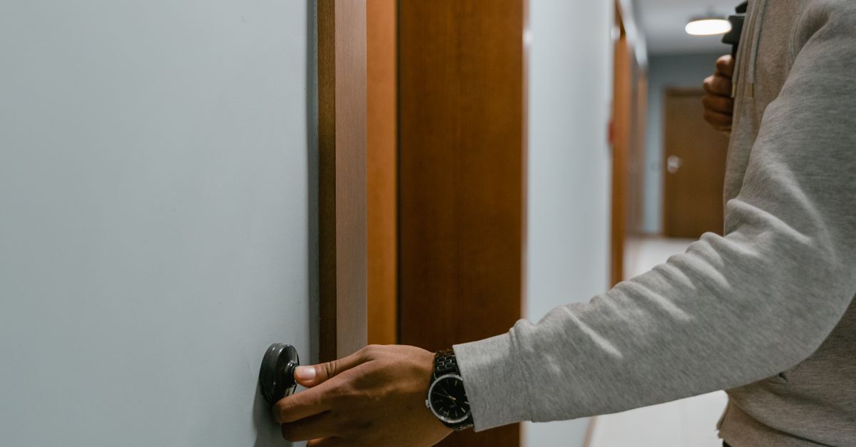 locksmith hands door — Montclair Locksmith Corp